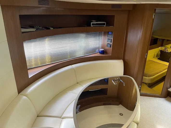  Yacht Photos Pics Luxurious interior of a 2012 Riva Rivale yacht with elegant seating and modern design.