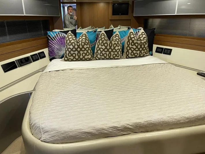  Yacht Photos Pics Luxurious 2012 Riva Rivale yacht bedroom with stylish bedding and modern decor.