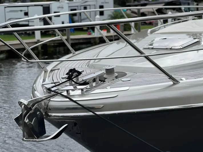  Yacht Photos Pics Luxury 2012 Riva Rivale yacht bow with sleek design and polished metal railings.