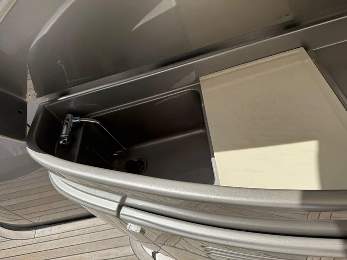  Yacht Photos Pics 2012 Riva Rivale yacht sink and countertop detail in sunlight.