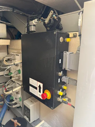  Yacht Photos Pics Engine compartment of a 2012 Riva Rivale, featuring control panel and wiring.