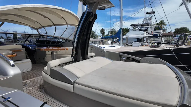  Yacht Photos Pics Luxurious 2012 Riva Rivale yacht with spacious deck and elegant seating at marina.