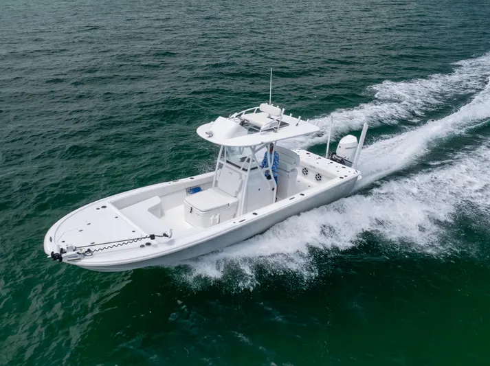  Yacht Photos Pics 2023 Canyon Bay 28h boat cruising on open water.