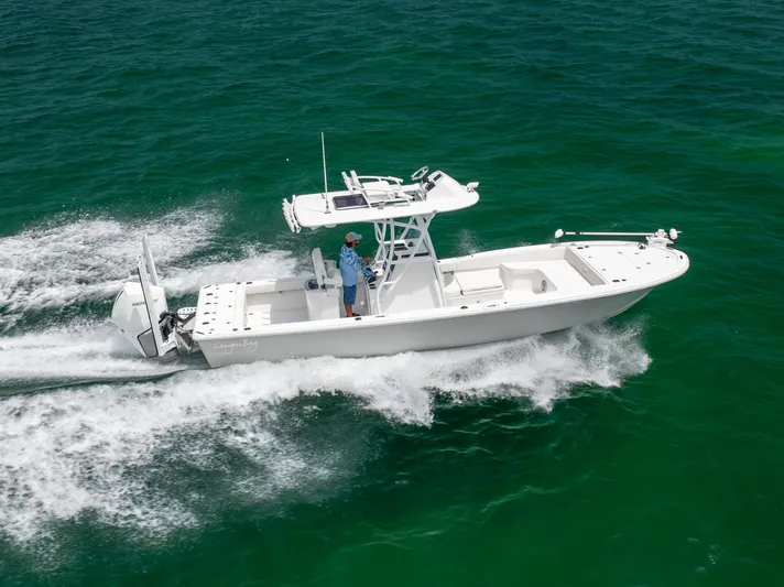  Yacht Photos Pics 2023 Canyon Bay 28h boat cruising on open water.