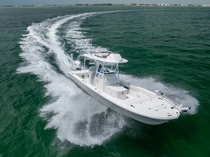  Yacht Photos Pics Canyon Bay 28h boat cruising on open water, 2023 model.