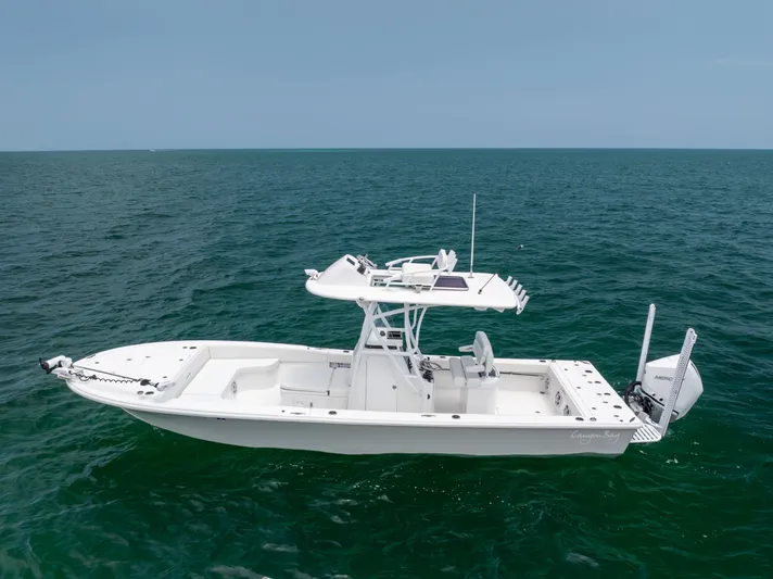  Yacht Photos Pics 2023 Canyon Bay 28h boat on open sea, side view.