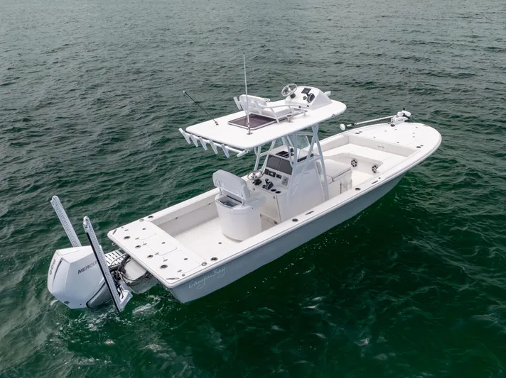  Yacht Photos Pics 2023 Canyon Bay 28h boat on open water, featuring sleek design and powerful engine.