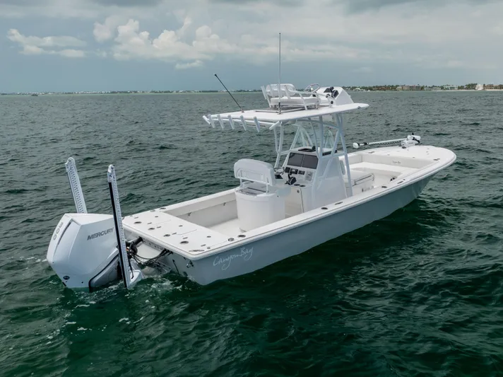  Yacht Photos Pics 2023 Canyon Bay 28h boat on open water, featuring a sleek design and powerful engine.