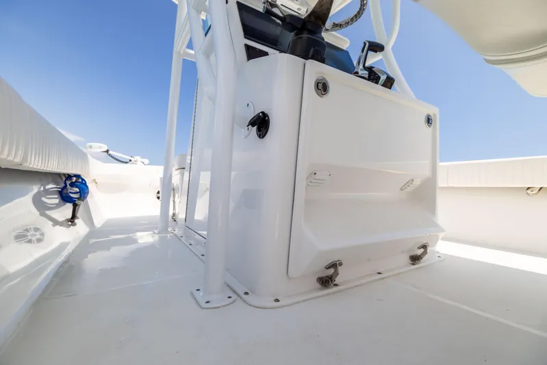  Yacht Photos Pics 2023 Canyon Bay 28h boat interior with white console and clear blue sky.