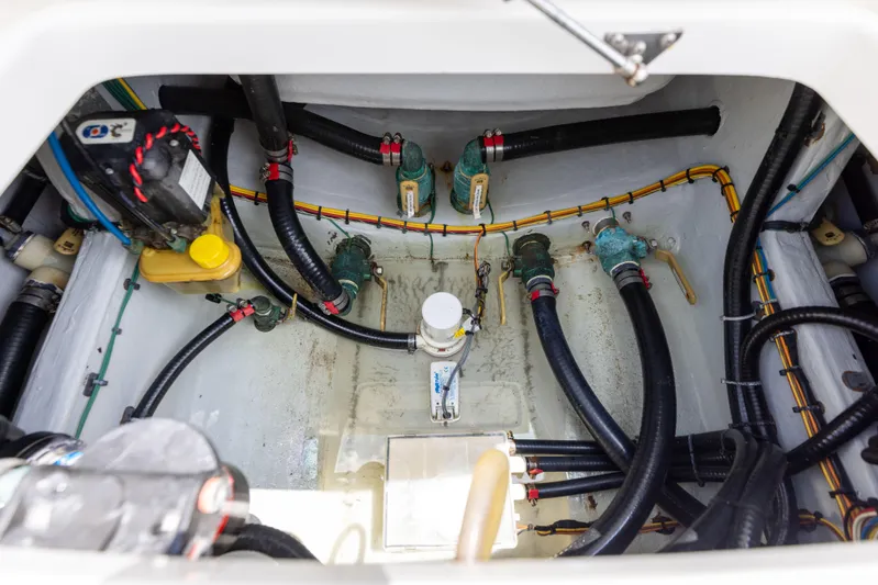 Yacht Photos Pics Canyon Bay 28h 2023 boat engine compartment with hoses and wiring.