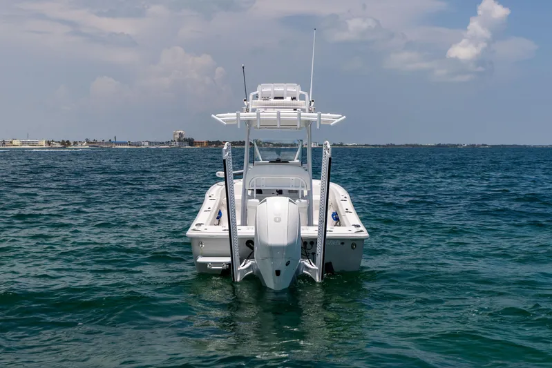  Yacht Photos Pics 2023 Canyon Bay 28h boat on open water, rear view.