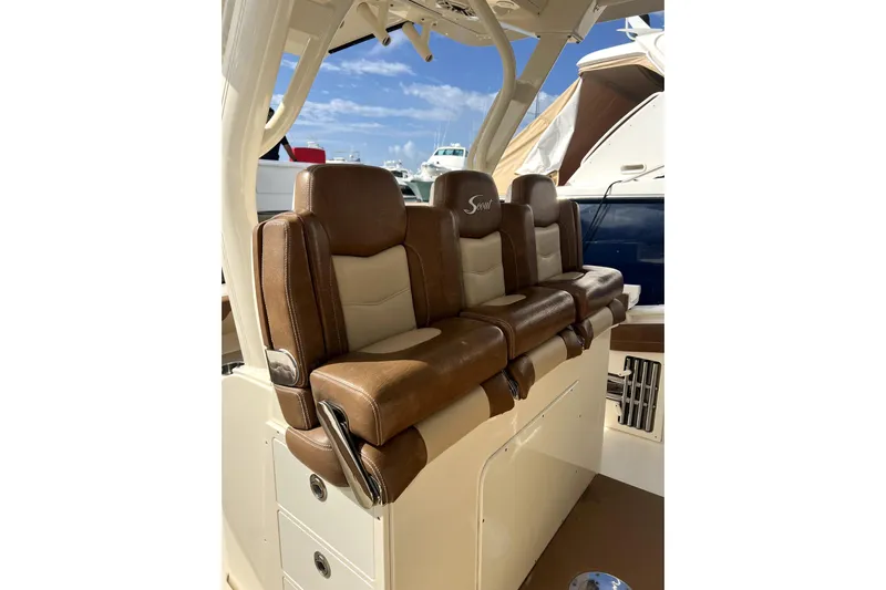 Bachita Yacht Photos Pics 2023 Scout 355 LXF boat with luxurious brown leather seating.
