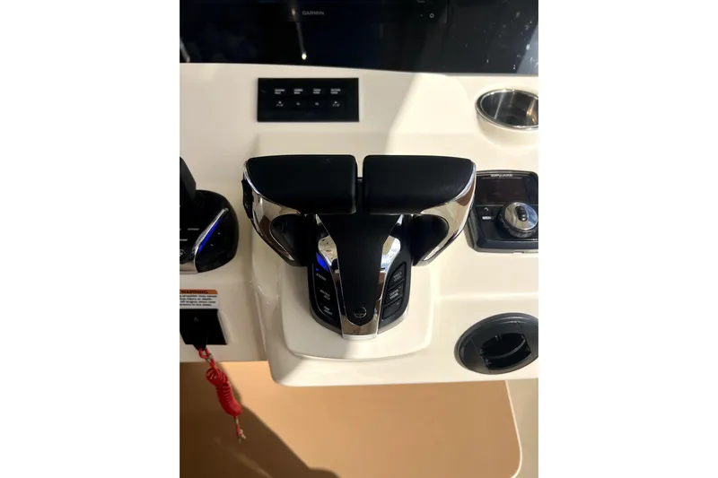 Bachita Yacht Photos Pics 2023 Scout 355 LXF boat throttle controls and dashboard close-up.