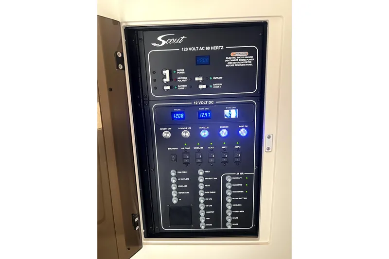 Bachita Yacht Photos Pics Control panel of 2023 Scout 355 LXF boat, featuring AC and DC systems.