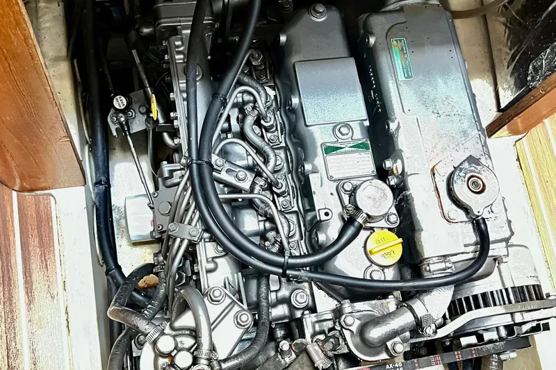 1754 Yacht Photos Pics Engine compartment of a 2004 Hunter 426 Owners Version sailboat, showcasing detailed mechanical components.