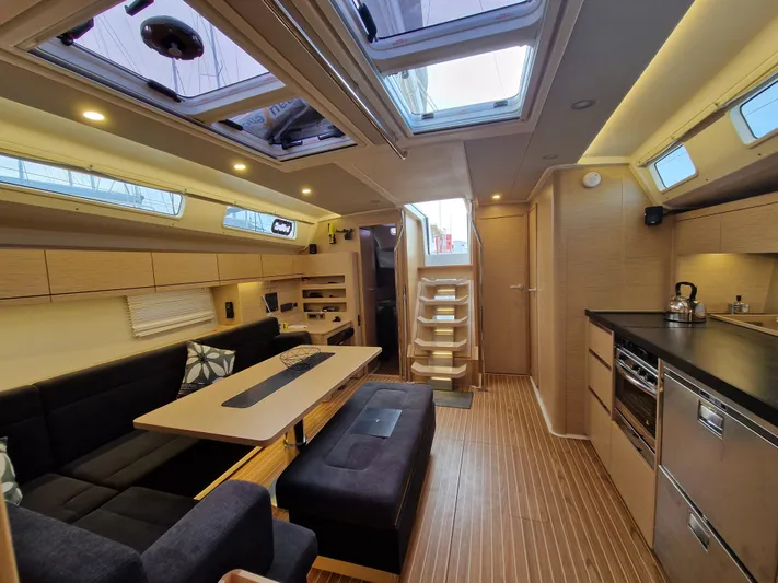  Yacht Photos Pics Luxurious interior of a 2020 Hanse 508 yacht with modern furnishings and ample natural light.