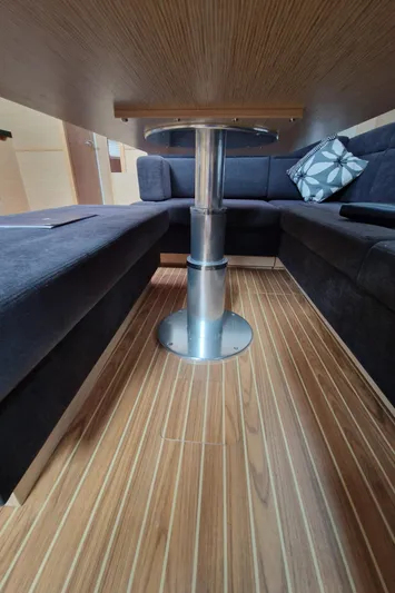  Yacht Photos Pics Interior of 2020 Hanse 508 yacht with wooden flooring and modern seating.