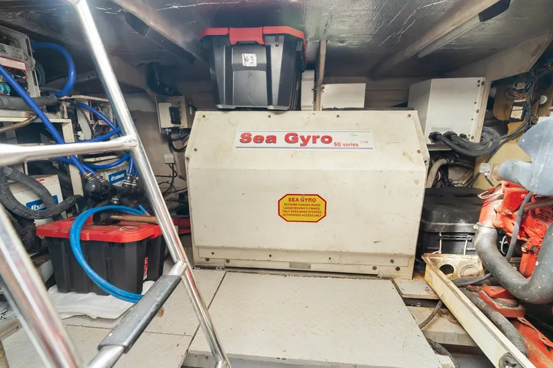 L'attitude Adjustment Yacht Photos Pics Engine room of 2001 Sea Ray 540 Cockpit Motor Yacht with Sea Gyro stabilizer.