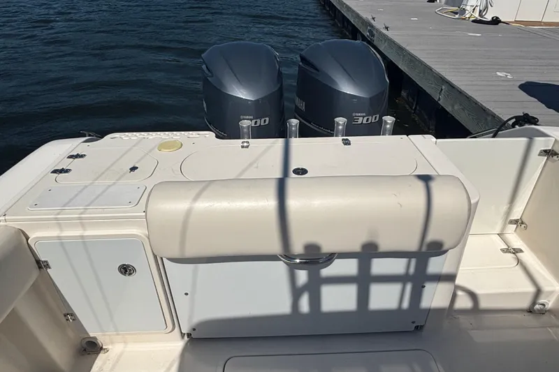  Yacht Photos Pics 2014 Pursuit C 310 Center Console boat with twin Yamaha 300 engines at dock.