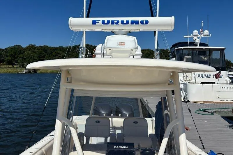  Yacht Photos Pics 2014 Pursuit C 310 Center Console boat docked with Furuno radar system.