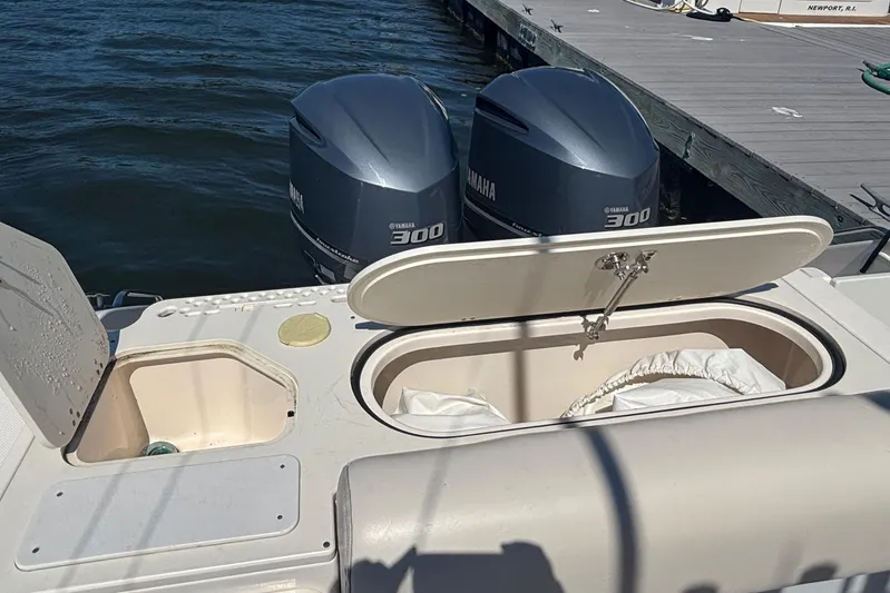  Yacht Photos Pics 2014 Pursuit C 310 Center Console with Yamaha 300 engines at dock.