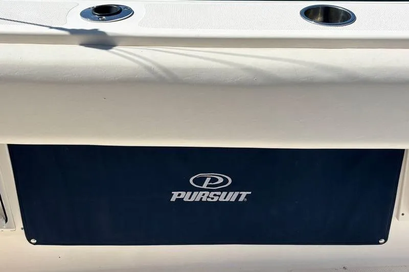  Yacht Photos Pics 2014 Pursuit C 310 Center Console boat with logo and cup holders.