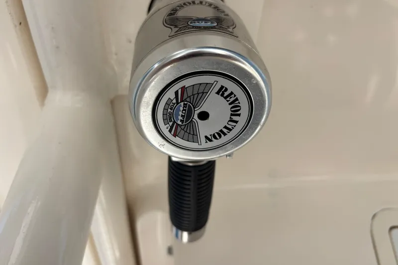  Yacht Photos Pics Close-up of a 2014 Pursuit C 310 Center Console boat control lever.