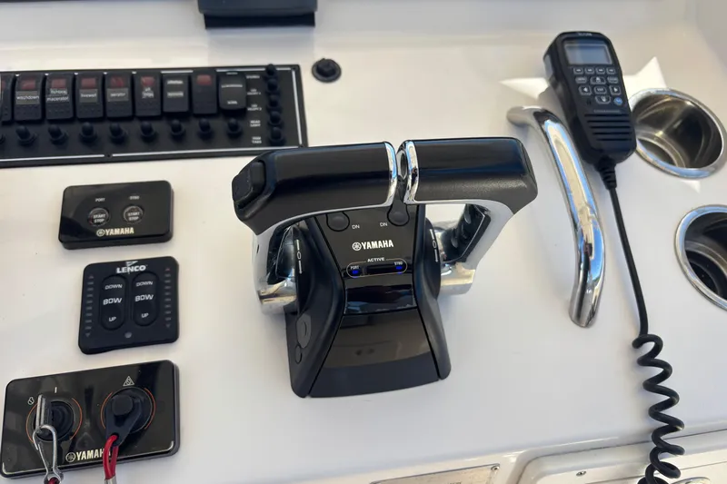  Yacht Photos Pics 2014 Pursuit C 310 Center Console boat controls with Yamaha throttle and radio.