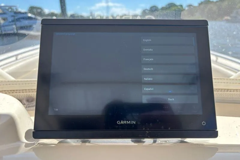  Yacht Photos Pics Garmin display on 2014 Pursuit C 310 Center Console boat, showing language selection screen.