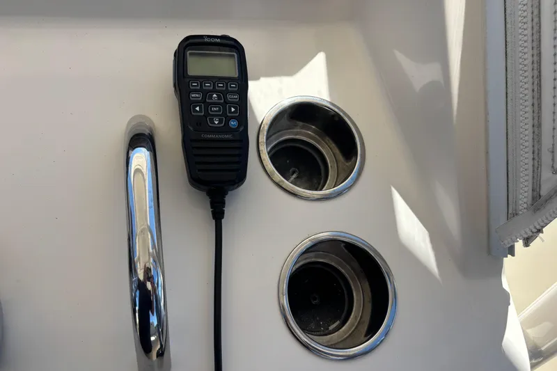  Yacht Photos Pics Boat console with radio and cup holders on 2014 Pursuit C 310 Center Console.