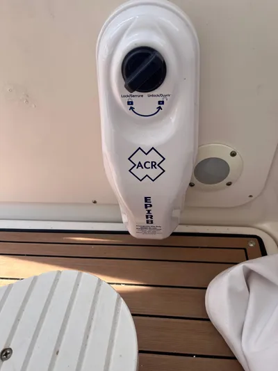 Greatest Escape Yacht Photos Pics ACR EPIRB device on 2006 Sea Ray 58 Sedan Bridge yacht deck.