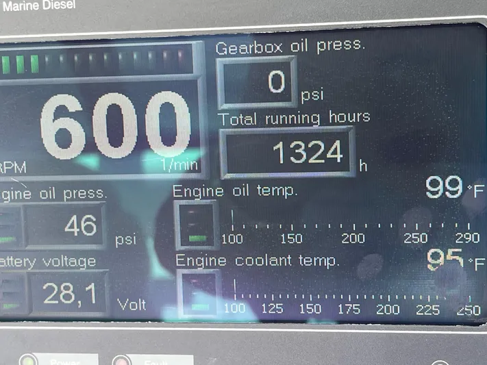 Greatest Escape Yacht Photos Pics Dashboard display of a 2006 Sea Ray 58 Sedan Bridge showing engine metrics.