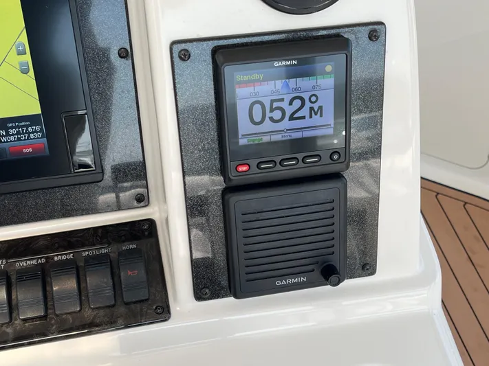 Greatest Escape Yacht Photos Pics Garmin navigation system on 2006 Sea Ray 58 Sedan Bridge yacht dashboard.