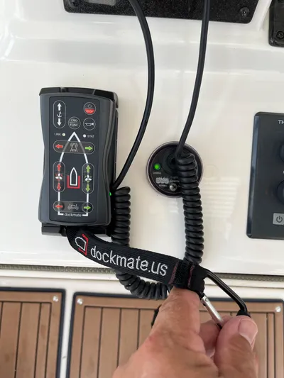 Greatest Escape Yacht Photos Pics Remote control system on 2006 Sea Ray 58 Sedan Bridge yacht dashboard.