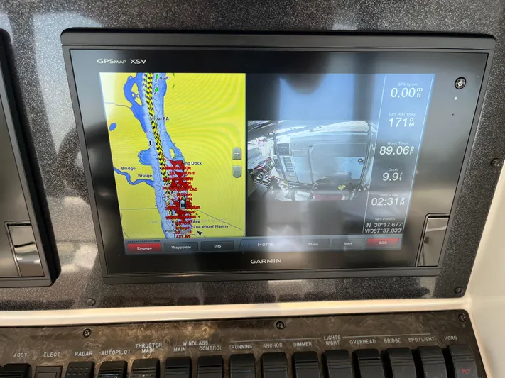 Greatest Escape Yacht Photos Pics Garmin GPS display on 2006 Sea Ray 58 Sedan Bridge showing navigation and engine data.