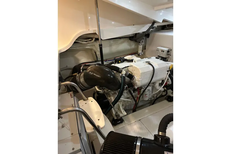  Yacht Photos Pics Engine room of 2014 Tiara Yachts 4300 Open, showcasing clean and organized machinery.