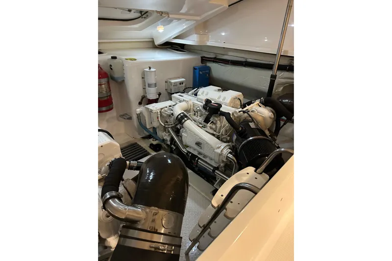  Yacht Photos Pics Engine room of 2014 Tiara Yachts 4300 Open, showcasing clean and organized machinery.