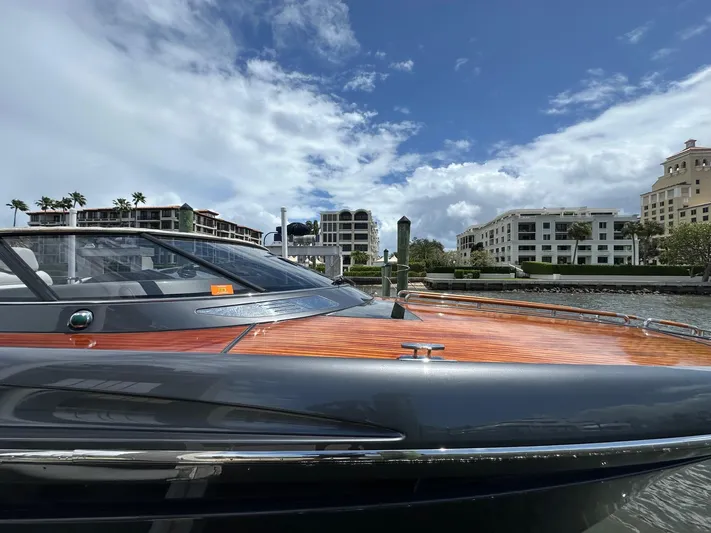 Lady D Yacht Photos Pics 2015 Riva Rivarama Super yacht docked, showcasing sleek design and luxury finish.