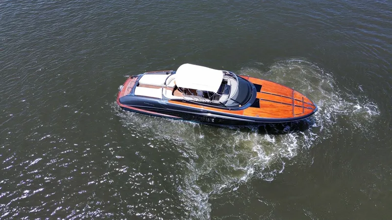 Lady D Yacht Photos Pics 2015 Riva Rivarama Super luxury yacht cruising on open water.