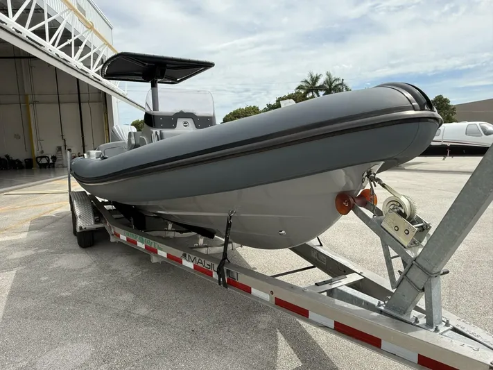  Yacht Photos Pics 2022 Ribeye 8.1m Outboard BL boat on trailer, parked outdoors.