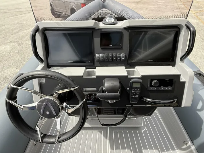 Yacht Photos Pics 2022 Ribeye 8.1m Outboard BL boat dashboard with dual screens and steering wheel.