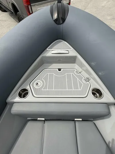  Yacht Photos Pics 2022 Ribeye 8.1m Outboard BL boat interior with sleek gray seating and cup holders.