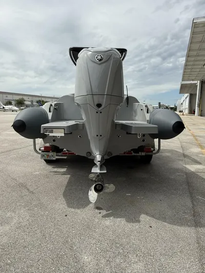  Yacht Photos Pics 2022 Ribeye 8.1m Outboard BL boat, rear view, parked outdoors.