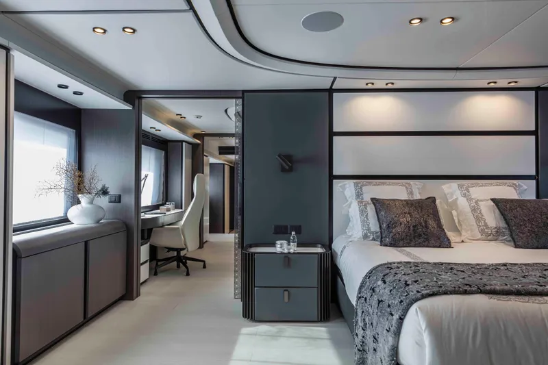 X130 Triplex Yacht Photos Pics Luxurious bedroom interior of 2026 Extra X130 TRIPLEX yacht with modern design.