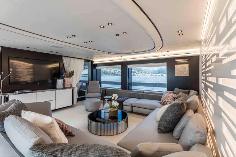 X130 Triplex Yacht Photos Pics Luxurious interior of the 2026 Extra X130 TRIPLEX yacht with modern furnishings and panoramic windows.