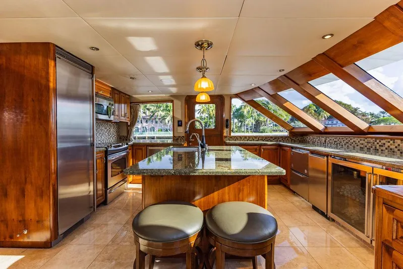 Empire Sea Yacht Photos Pics Luxurious yacht kitchen with wood cabinetry and granite island, built in 2009.