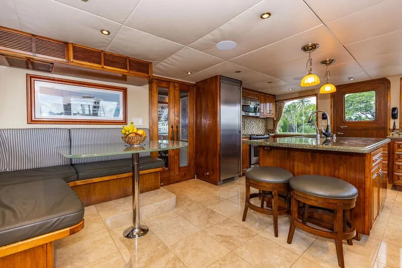Empire Sea Yacht Photos Pics Luxurious yacht interior with kitchen and dining area, Crystal Yachts 2009.