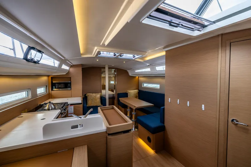 Into The Blue Yacht Photos Pics Interior of 2022 Jeanneau Sun Odyssey 410 yacht, featuring modern design and spacious layout.