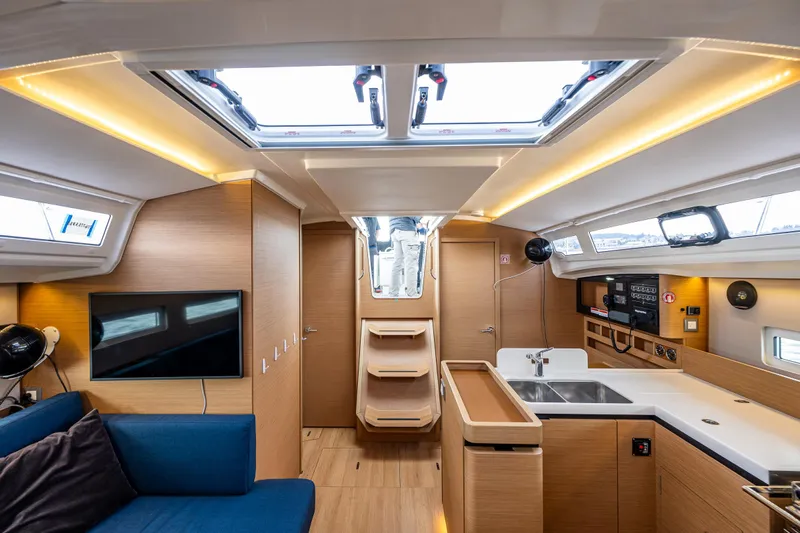 Into The Blue Yacht Photos Pics Interior of 2022 Jeanneau Sun Odyssey 410 yacht, featuring modern design and spacious layout.