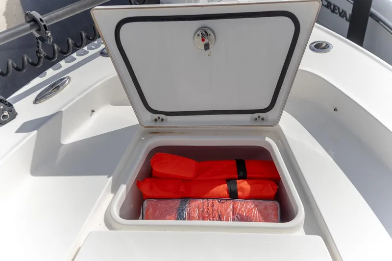  Yacht Photos Pics Storage compartment on 2024 Crevalle 26 HCO boat with life jackets inside.